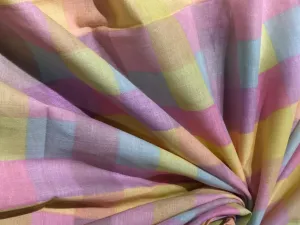 100% Cotton Poplin  Prints 58" wide available in 3 prints pastel color plaids/bunnies and cream with blue lavender floral